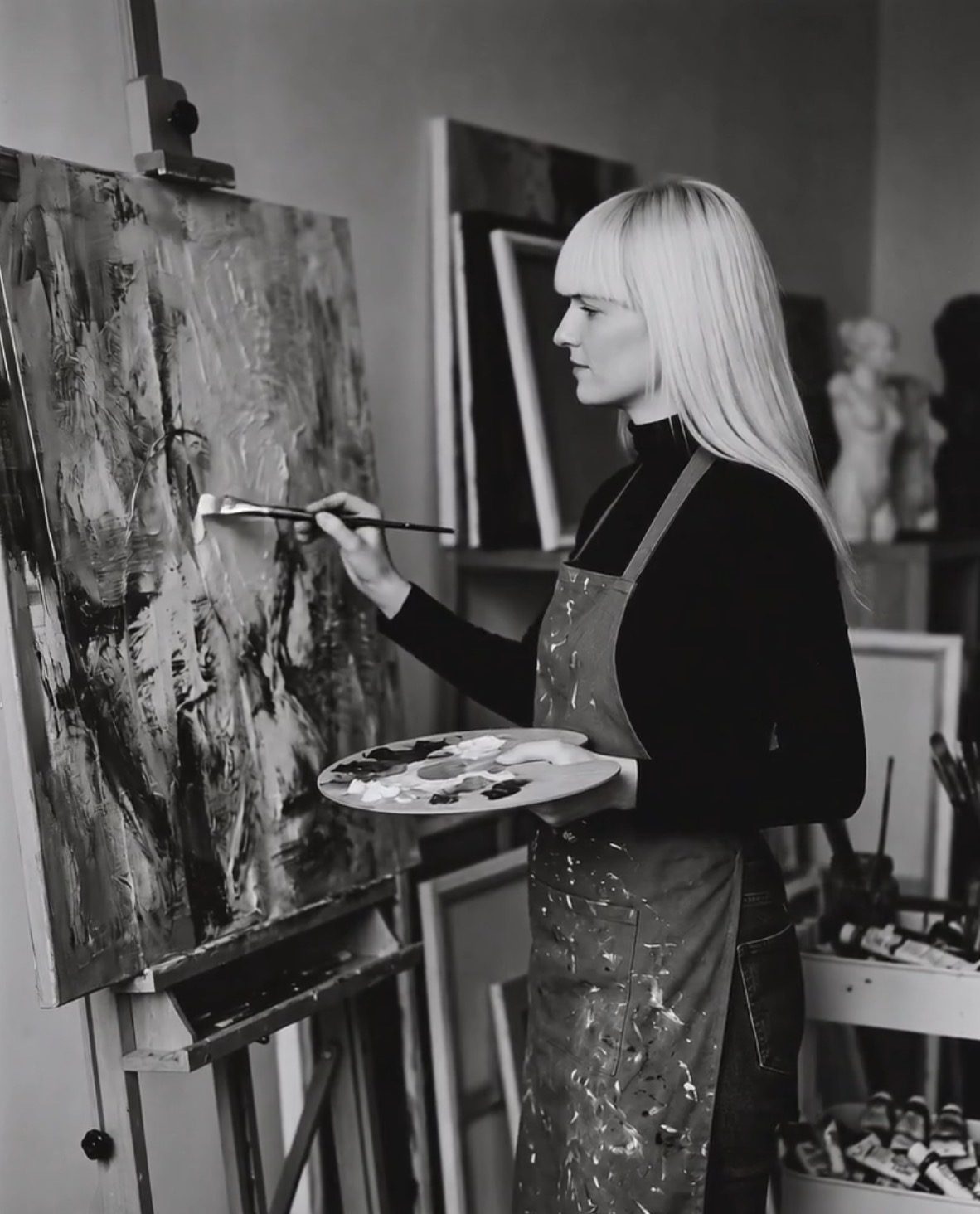 Katarzyna Hasnik painting in her studio